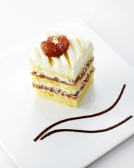 Delicate chestnut cake on a white background