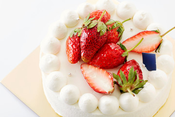 Delicious strawberry cake on white background