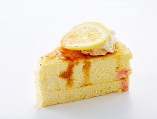 Delicious little cake cut pieces on white background