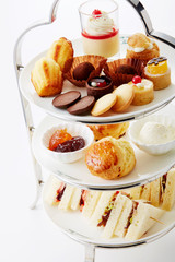 Delicious afternoon tea pastry collection on white background