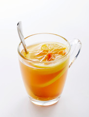 Delicious hot lemon tea on a white background