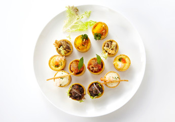 Delicious western-style snack platter on a white background