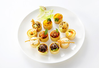 Delicious western-style snack platter on a white background