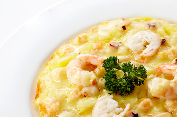 Delicious seafood small pizza on white background