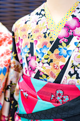 Yukata on the woman statue display for rent and sales., Osaka, Japan.