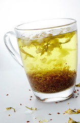 Warm flower tea drink on a white background