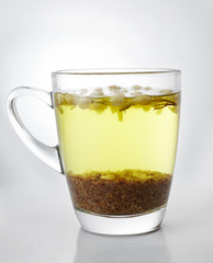 Warm flower tea drink on a white background