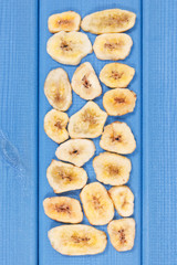 Homemade dried chips of banana for snack or dessert