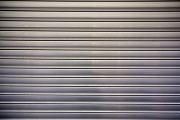 Obraz premium Detail of a Metal Garage Door Texture