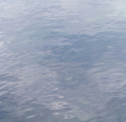 Expanse of water in the river as an abstract background