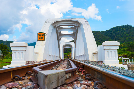Railroad passes the white bridge at Lamphun, Thailand.