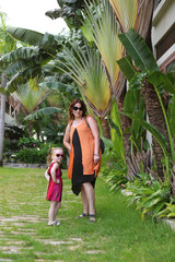 girl with a child in sunglasses