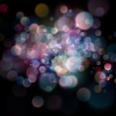 Abstract defocused circular color bokeh on dark background. EPS 10