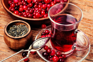 Aromatic hot tea on wooden table