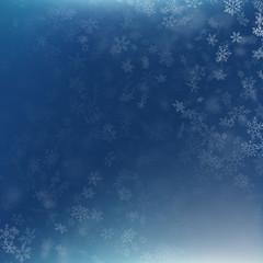 Fototapeta na wymiar Falling snow on a blue background. Abstract white snowflake and sparkles background. EPS 10
