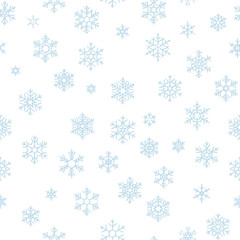 Christmas seamless pattern with light blue snowflakes on white background. EPS 10