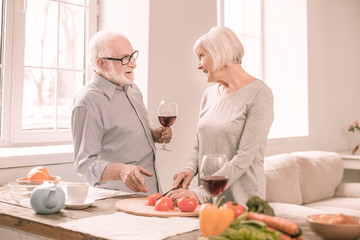 Kind mature people going to have dinner at home