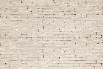 Fototapeta premium Brick wall texture background painted in light antique sepia brown color in grunge style