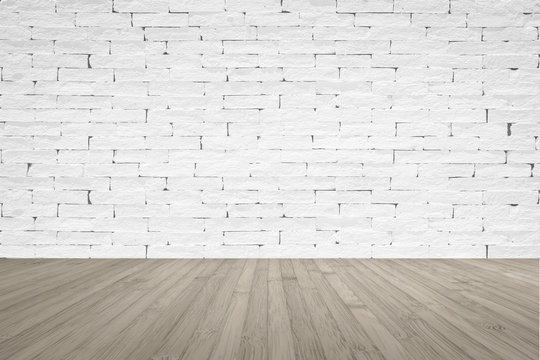Brick wall with wooden floor textured background in light grey with vignette