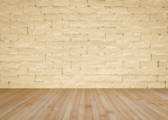 Grunge brick wall painted in light yellow beige with wooden floor in natural brown for interior backgrounds