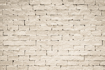 Fototapeta premium Brick wall pattern texture background painted in light cream color