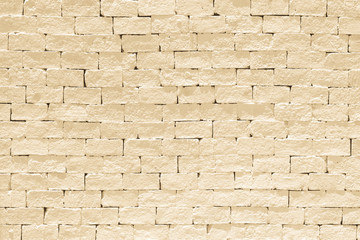 Brick wall pattern texture background painted in light yellow cream color