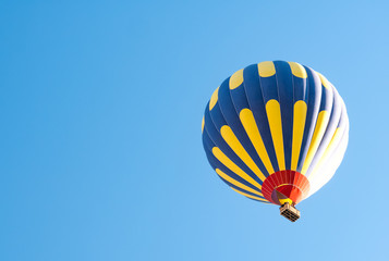 Hot air balloon over blue sky