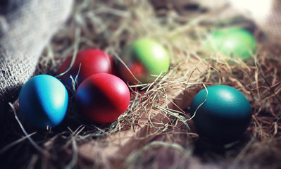 Easter painted eggs on burlap