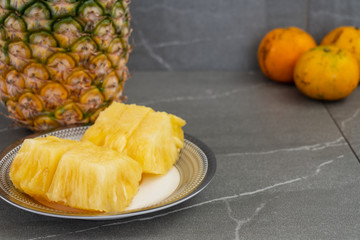 Fresh fruit, Pineapple and oranges.