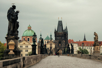 Fototapeta na wymiar View on empty Charles bridge in Prague, Czech Republic