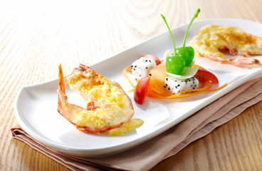 Delicious cheese prawn, on a wood grain background