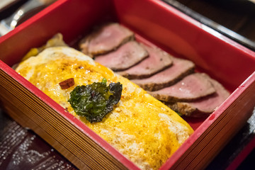 Wagyu meat with Omelette with rice served on plate, Japanese food