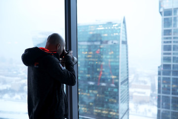 Journey. Tourist with a camera takes photos of beautiful places.