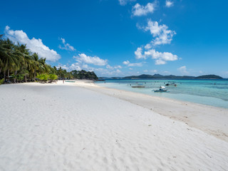 Beautiful white sand beach and blue sky. Coron, Busuanga island, Palawan province, Philippines. November, 2018