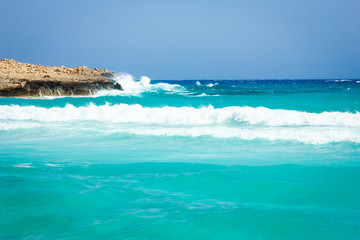 beautiful beach with waves in the nature of the background