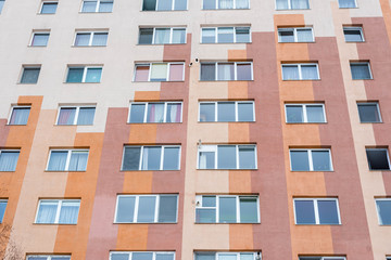 Colorful modern tower building facade in a small city in Romania.