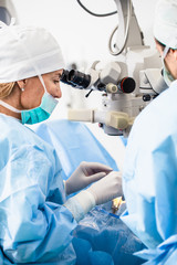 Eye surgery process, treatment of cataract and diopter correction. Surgical implementation of multifocal lens implants. Medical healthcare and technology theme.