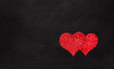 Glittering red hearts