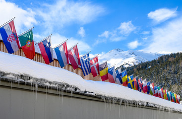 International flags on top of Congress center in Davos, Switzerland.
