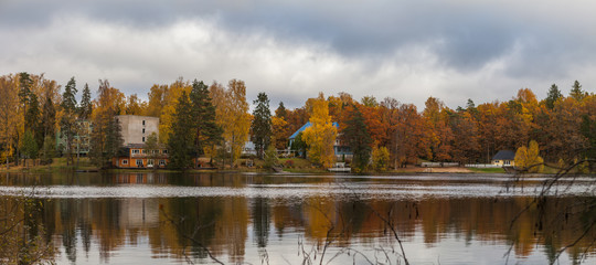 Houses on the shore of the lake ar fall season. Nelijarve, Estonia.