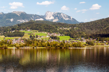 Fototapeta na wymiar Alpbach lake in the austrian alps on a sunny day.