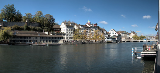 Fototapeta na wymiar Riverside buildings on the Limmat in Zürich, Switzerland