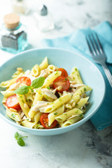 Pasta salad with tomato and chicken