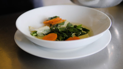 vegetable soup cap cay in bowl. traditional Asian soup cap cay