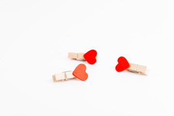 Three cloth pin with heart. Space for text. Valentine's Day. Love concept.