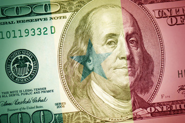 Obraz na płótnie Canvas flag of senegal on a american dollar money background