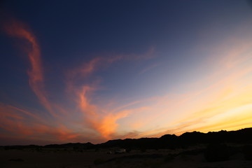 the light of the sunrise in the  desert