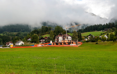 Fototapeta premium Rural village in the Austrian Alps on a cloudy day