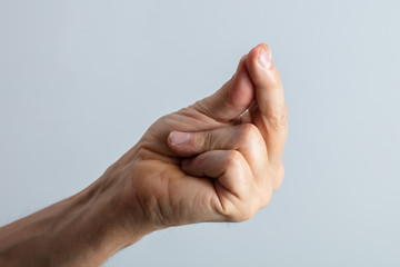 Man's Hand Snapping His Finger