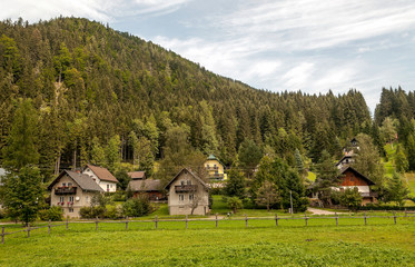 Fototapeta na wymiar Rural village in the Austrian Alps on a cloudy day